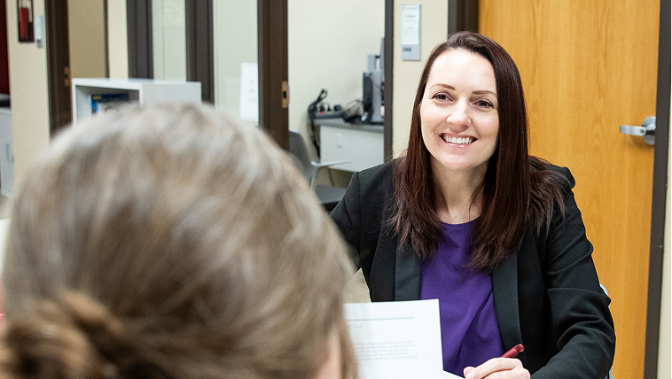 Student talking to career services specialist